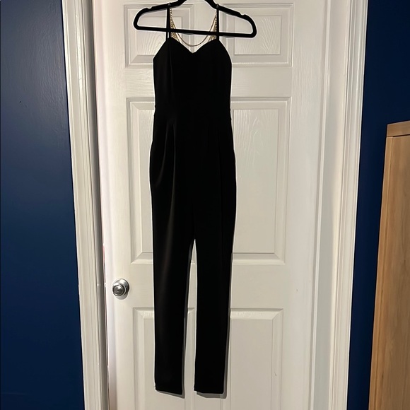 Elegant Black Chain-Back Jumpsuit - Picture 3 of 5